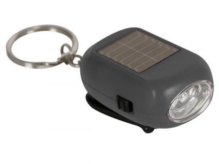 SLEUTELHANGER ZAKLAMP ZONNE DYNAMO ENERGIE - Sleutelhanger met LED zaklamp zonne-enrgie en dynamo.Altijd een lampje bij de hand!