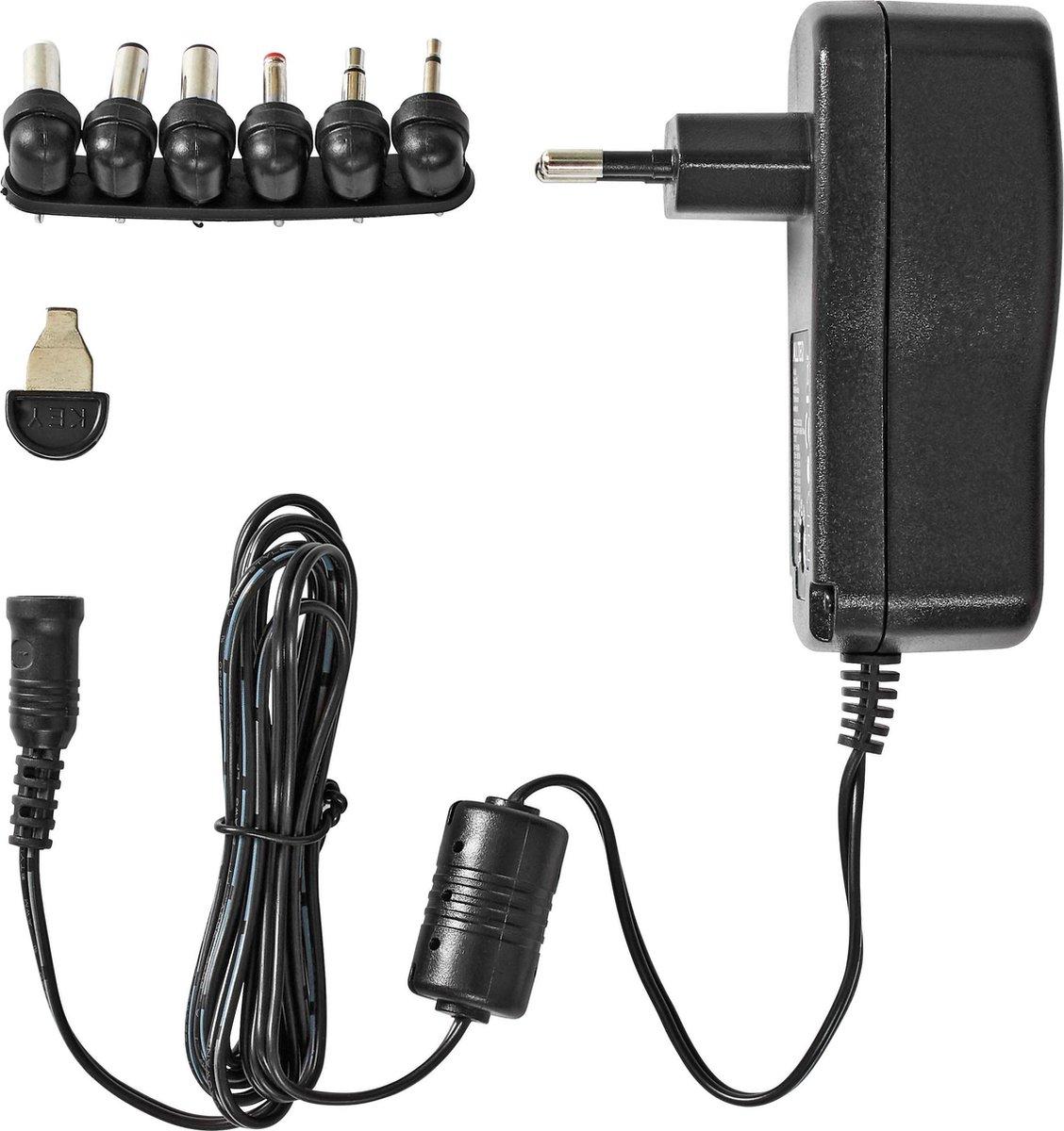 UNIVERSELE AC / DC Adapter Universele AC/DC Adapter, Voedingsstekkers: 6 stuks, Let op de polariteit bij de plug, Ingangsvoltage: 100-240 V AC, 50/60 Hz, Uitgangsvoltage: 9 / 12 /