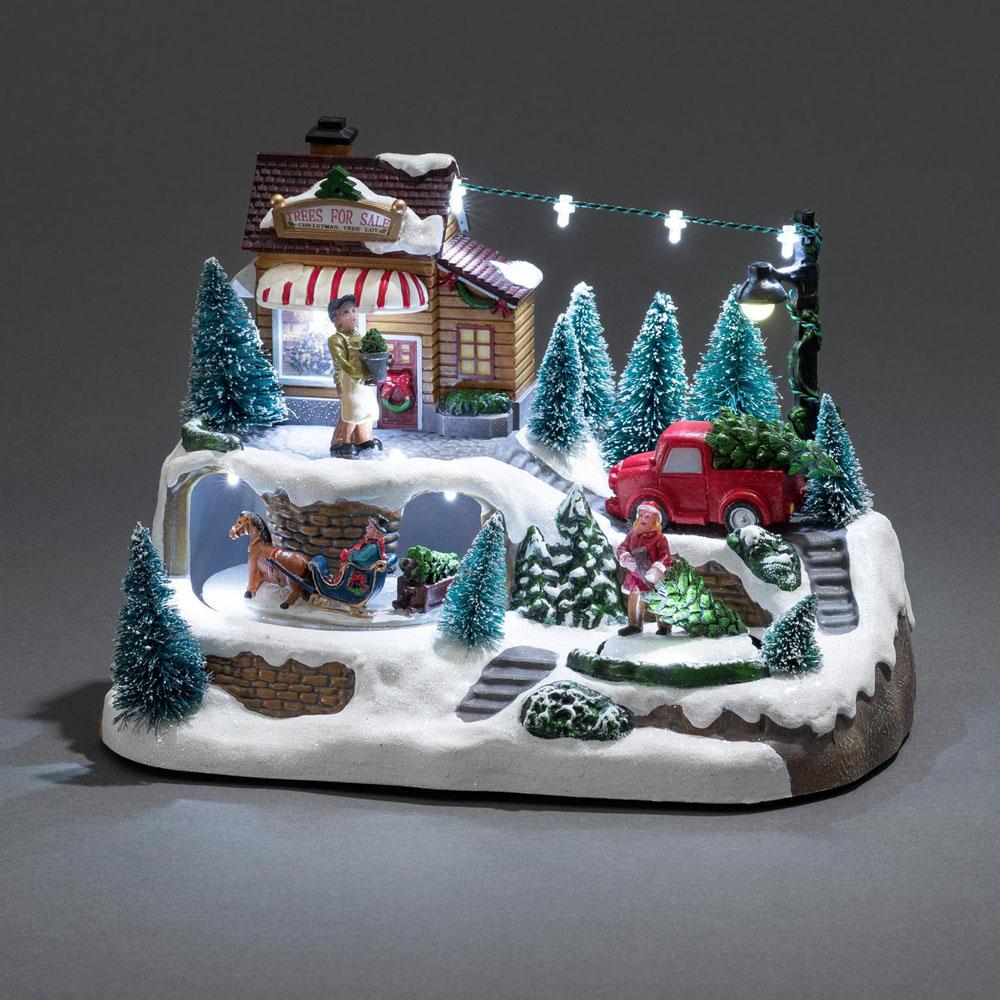 Led kersthuisje - 9 lampjes - 3x AA batterijen - 23.5 x 17 centimeter - animatie en muziek - warm wit